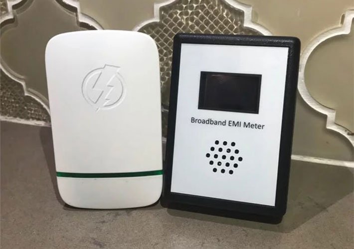 Power Saver Pro X next to an EMI meter showing a reduction in dirty electricity